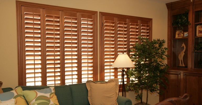 Hardwood shutters in Raleigh living room.